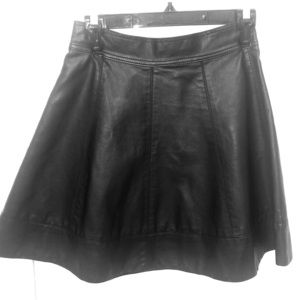 Gorgeous faux leather Bebe circle skirt. Pristine